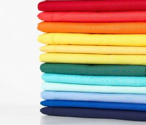 Stacking-Lots-Of-T-Shirts-In-Your-Closet-a